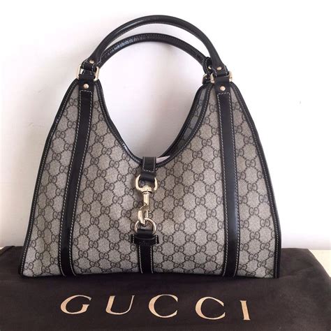 white gucci bag with red gg monogram|Gucci monogram hobo bag.